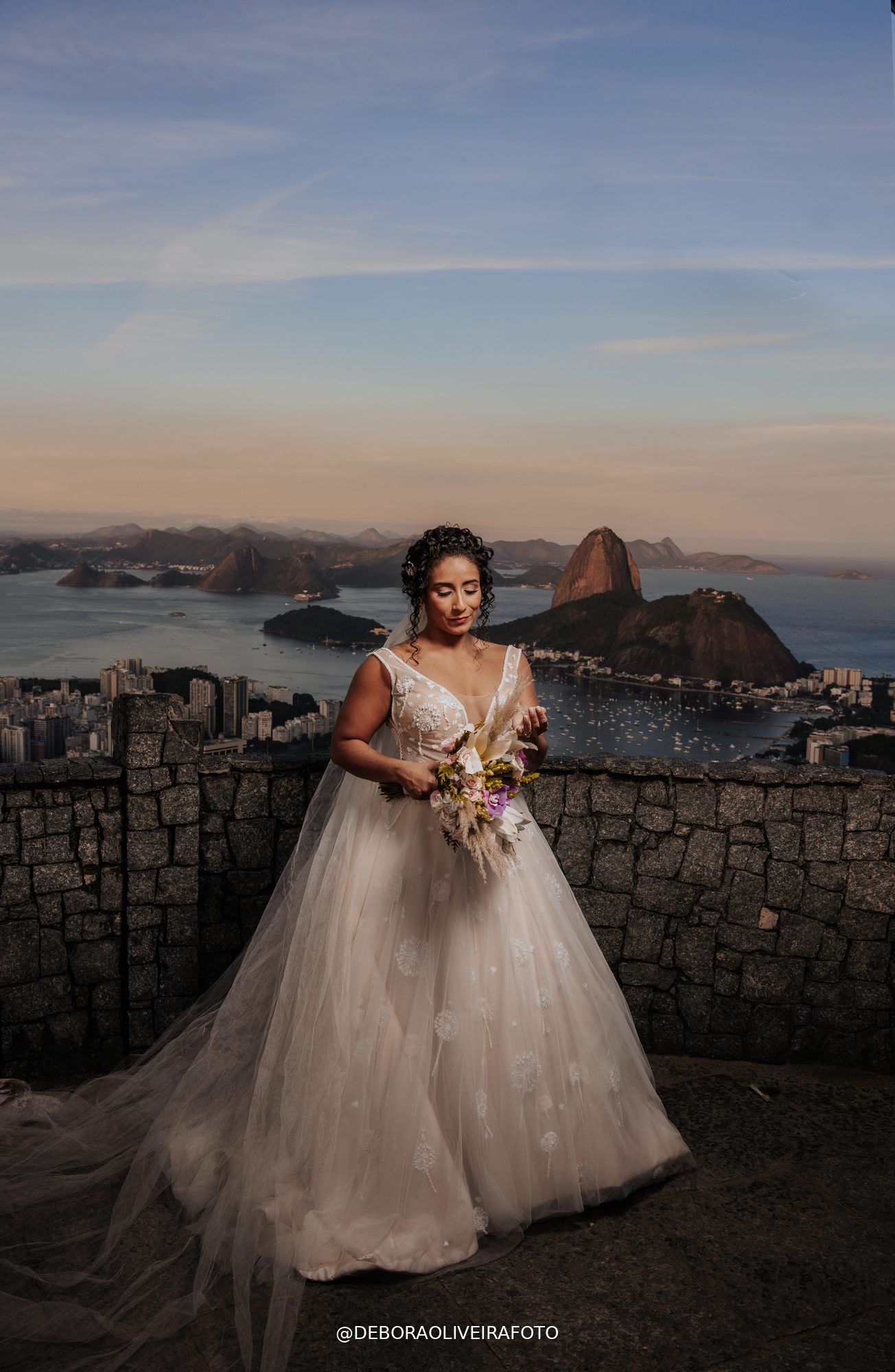 Bride at Mirante Dona Marta with panoramic view of Rio de Janeiro and Sugarloaf Mountain